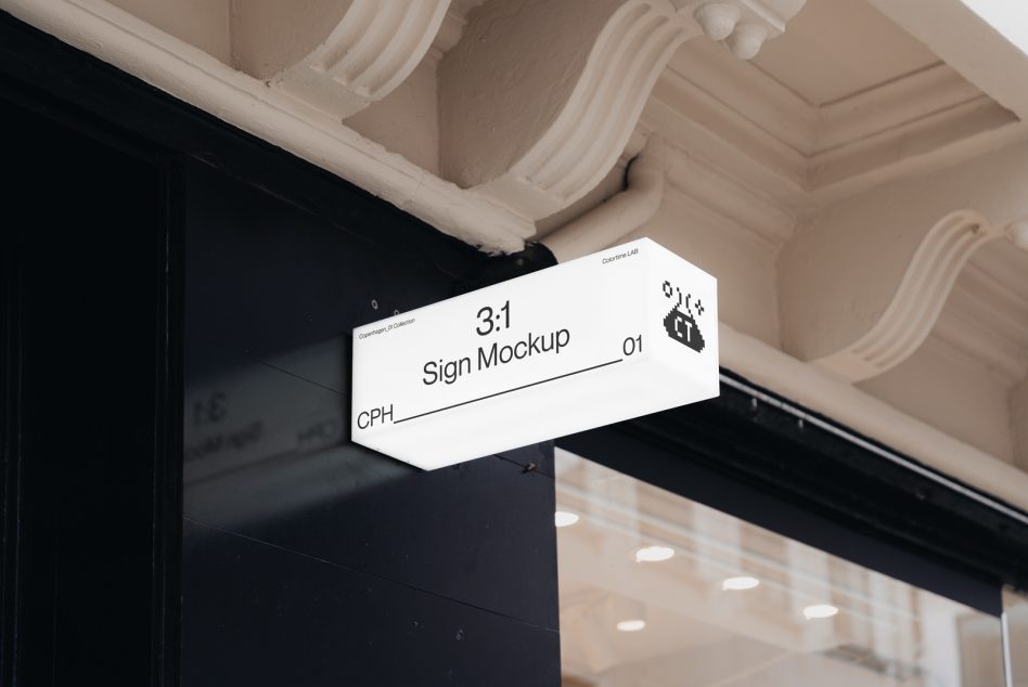 White 3:1 hexagonal sign mockup suspended below decorative ceiling trim interior