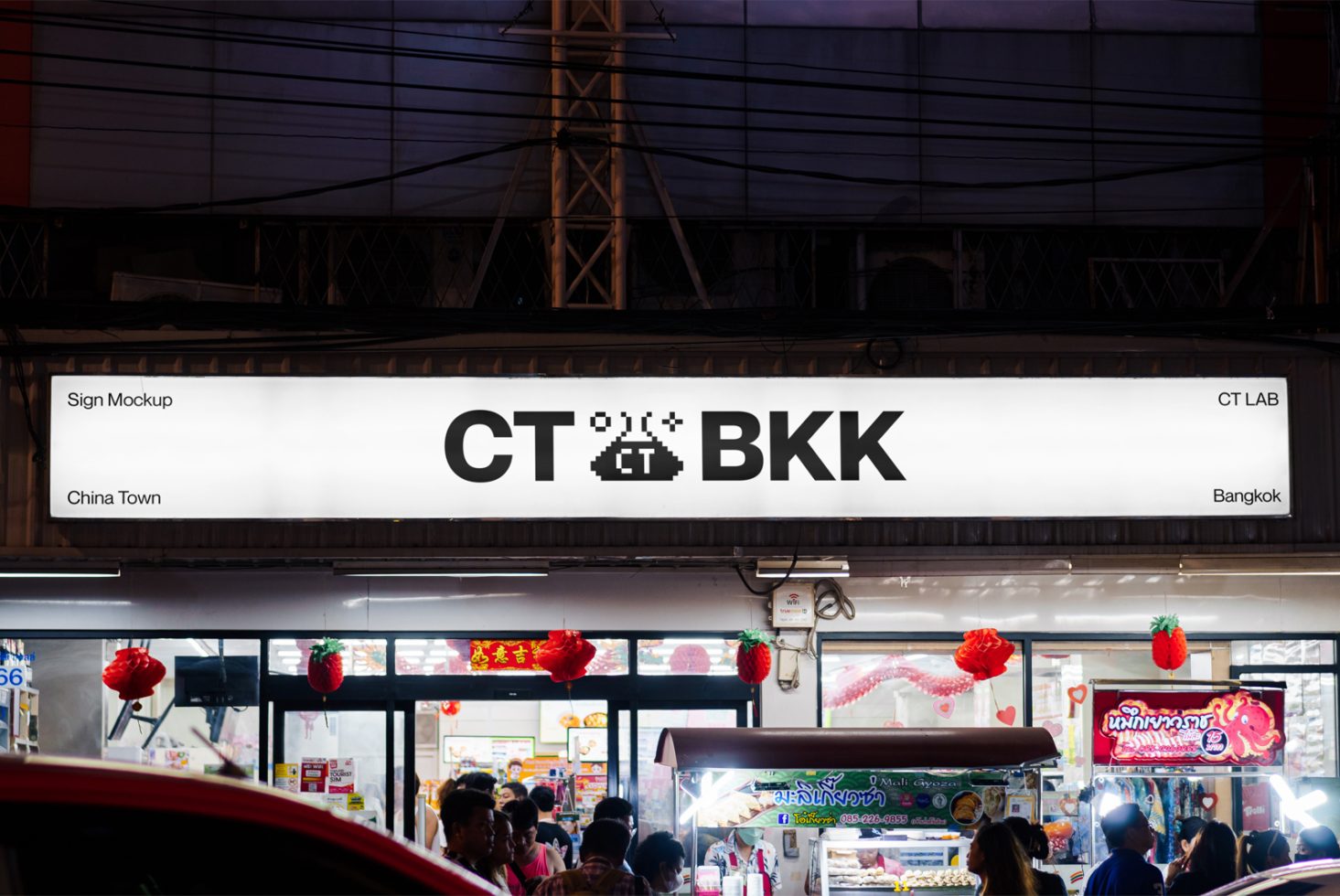 Illuminated sign mockup showcasing pixel art style design above a busy night market scene, ideal asset for graphic display presentations.