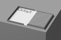 Light gray Orbyt box set with white interior, showing branded cover with textured card design