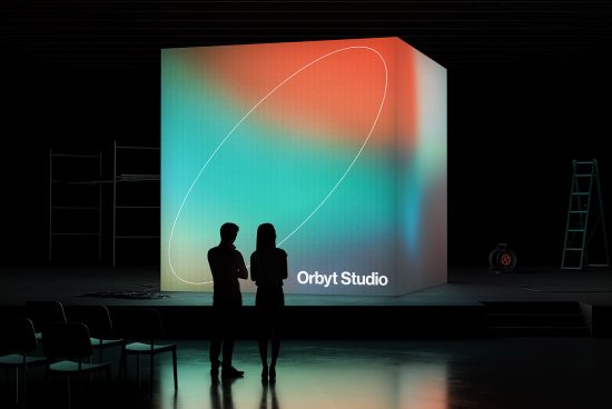 Exhibition mockup with colorful abstract graphic design on display and silhouettes of two onlookers in a gallery setting, ideal for presentations.