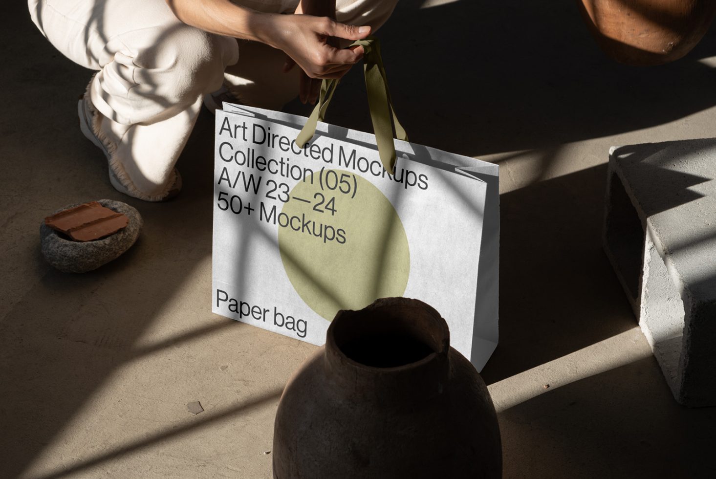 Art directed mockup collection advertising with paper bag graphic design, in a natural light setting for creative designers marketplace.