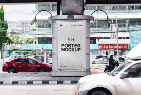 Urban poster mockup on a bus stop kiosk in a busy city setting, ideal for presenting advertising designs to clients, relevant for mockups category.