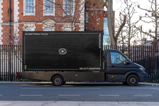 Side view of a parked delivery truck with a blank advertisement side panel, ideal for mockup graphics display in urban setting.