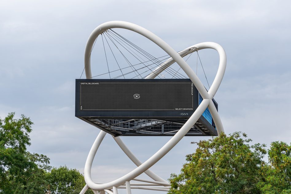 Modern digital billboard mockup integrated into an urban setting with unique architectural elements, suitable for advertising design display.