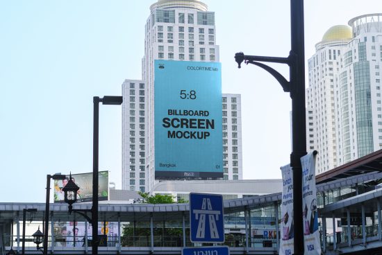 Urban billboard screen mockup in a city environment with clear sky, showcasing realistic advertising space for designer presentations.