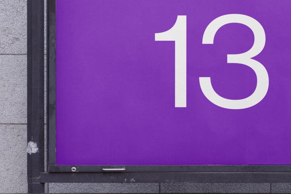 Bold white number 13 on a vibrant purple background, ideal for graphic design, number mockups, and minimalist templates.