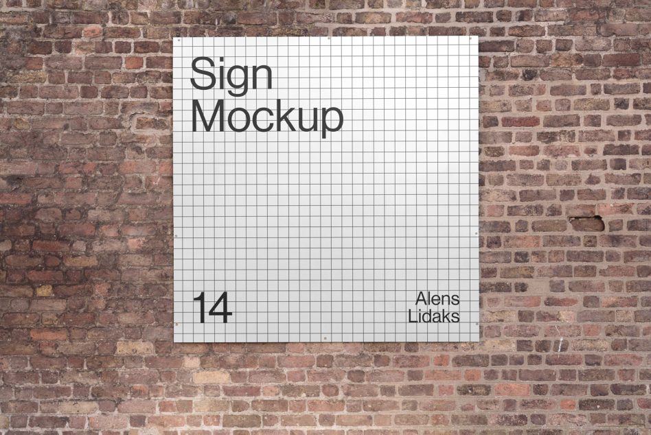 White grid-patterned sign on exposed brick wall showing number 14, minimalist layout