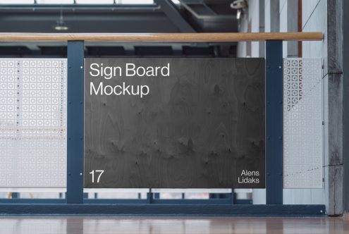 Realistic sign board mockup displayed in an industrial setting perfect for showcasing signage designs and branding visuals.