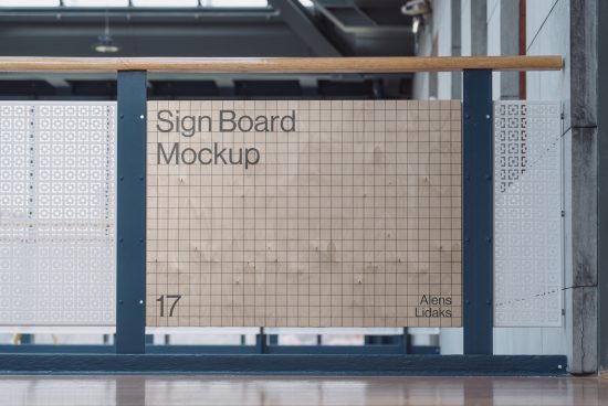 Urban signboard mockup with a grid pattern, displayed in an industrial setting, perfect for signage presentations and graphic design showcases.