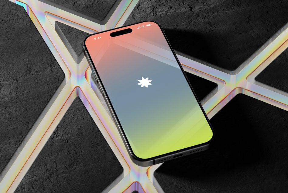 iPhone mockup with coral to lime gradient screen on concrete with neon accents