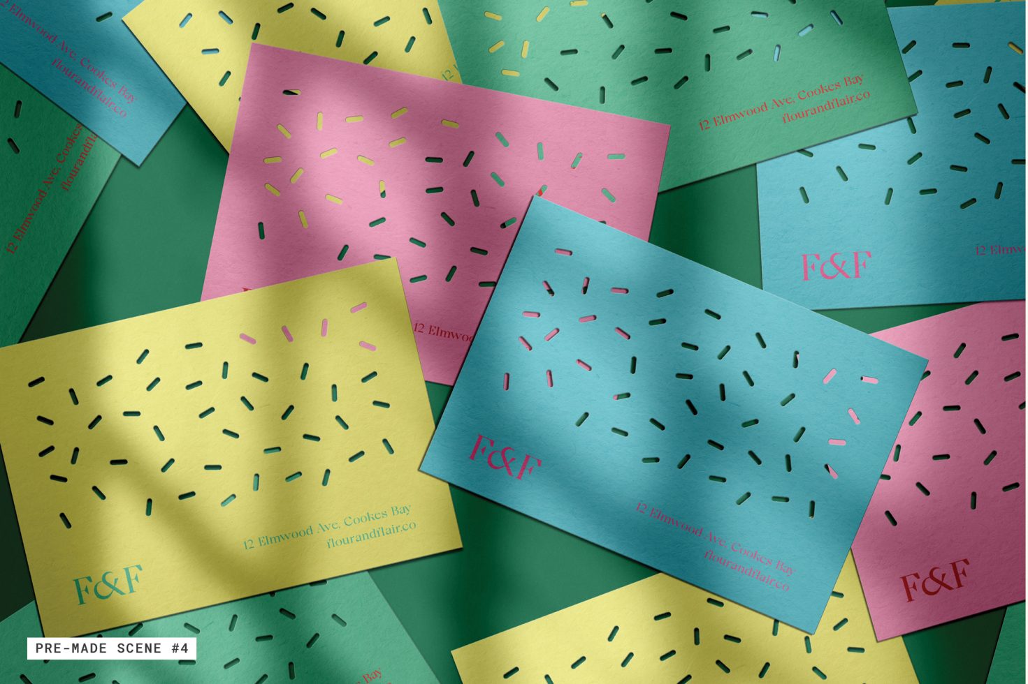 Colorful business card mockup with sprinkles pattern, scattered on textured background, perfect for design presentations and branding.