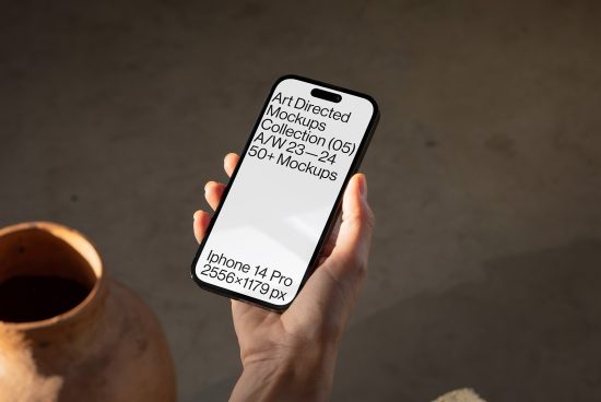 Hand holding smartphone showcasing a design mockup template with a minimal text overlay, ideal for digital asset designers.