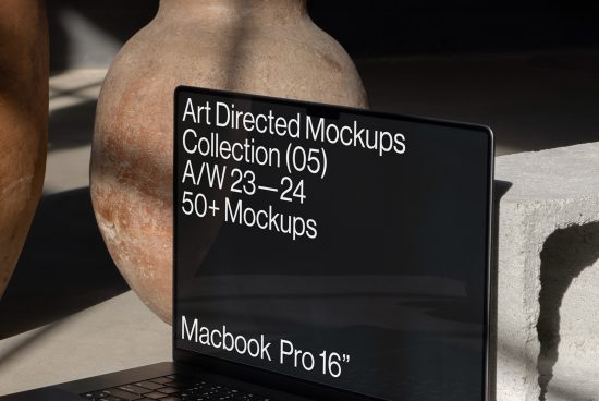 Laptop screen showcasing Art Directed Mockups Collection ad, indicating modern design templates available for professional designers.