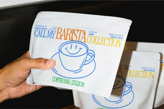 Hand holding a coffee package mockup with a smiling cup design, demonstrating product packaging concept for designers.