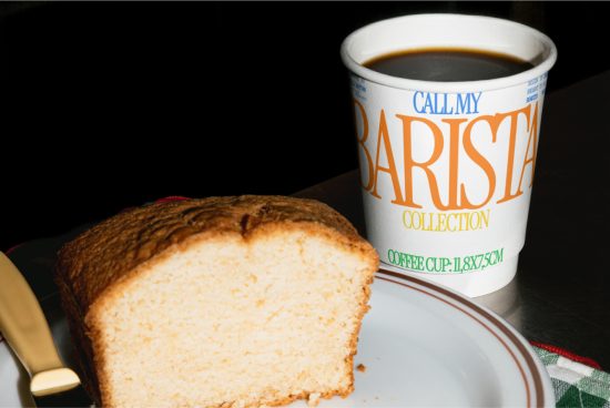 Paper coffee cup with 'Barista Collection' text beside a slice of cake on a plate for mockup, on dark background, ideal for branding and design presentations.