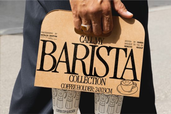 Person holding a custom cardboard coffee holder mockup with barista design, ideal for branding and packaging projects.