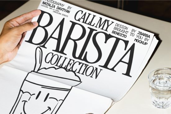 Creative magazine mockup design featuring bold typography, 'Barista Collection' theme, with realistic hand holding the page, glass of water on side.