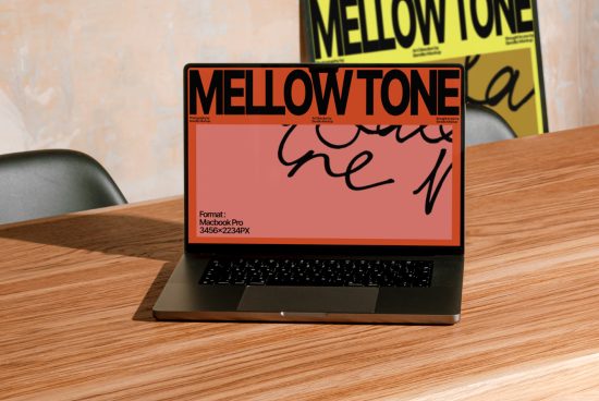 Laptop on desk with stylish font graphic design on screen, mockup for brand presentation, creative workspace setting, design concept.