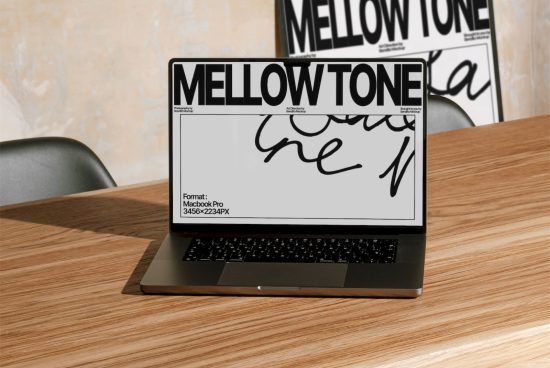 Laptop mockup on wood desk with artistic font display, realistic office setting for design presentation, digital asset for designers.