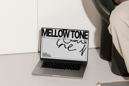 Laptop on desk displaying font design mockup, graphic design, modern calligraphy, Mellowtone, suitable for font creators, digital artists.