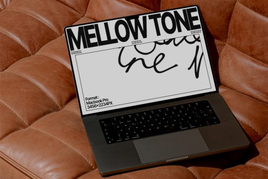 Laptop on leather sofa displaying bold MELLOWTONE font design, ideal mockup for showcasing typography, clear resolution, design asset.