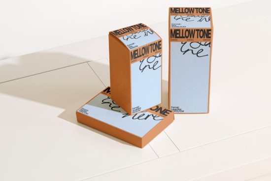 Orange and white product packaging mockup with modern design, shadow effect, ideal for presentations and portfolios.