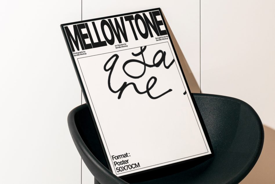 Poster mockup on black chair with clean black border, editorial style