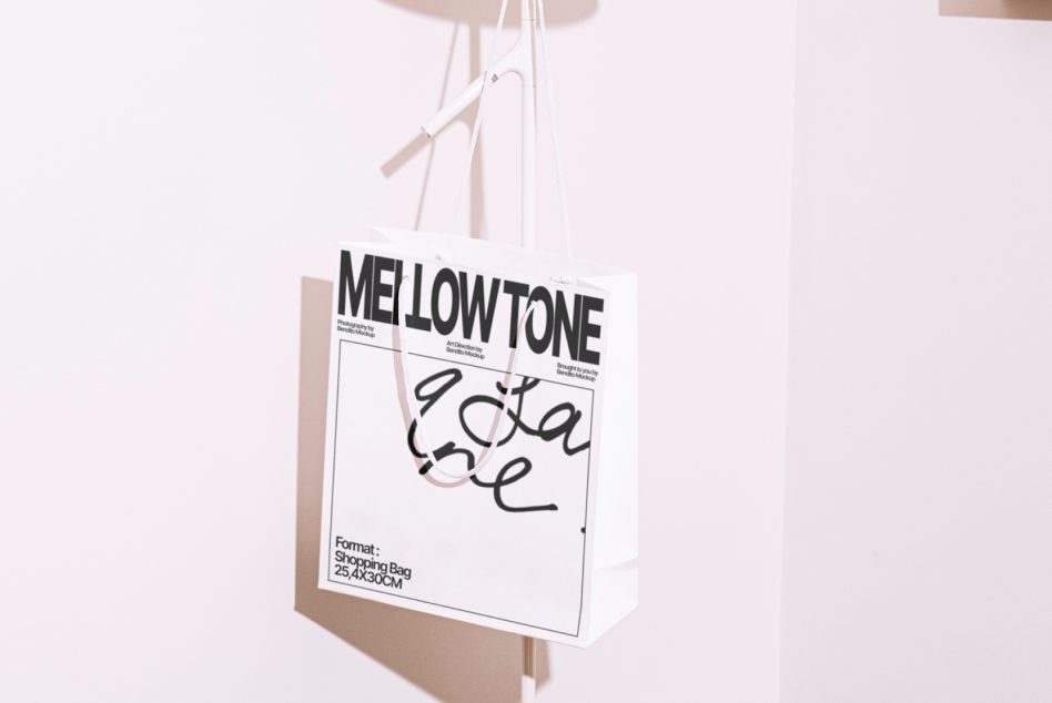 White paper shopping bag mockup with mellow tone logo, cream background