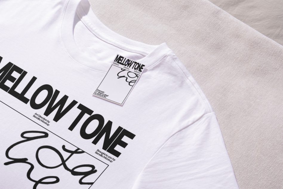 White crew neck tee with mellow tone label, minimalist black text design