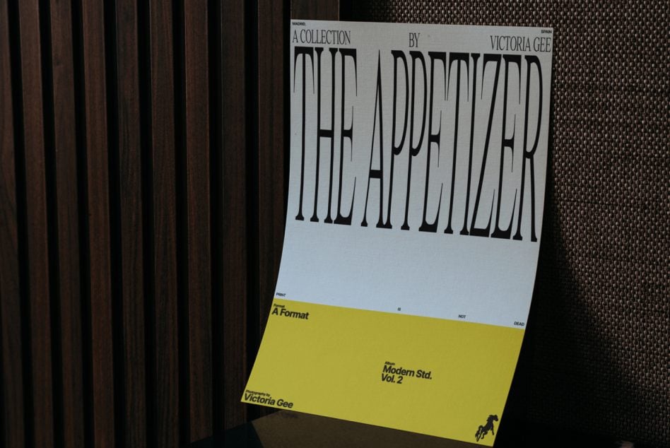Magazine layout mockup with yellow accent bar showing serif typography design
