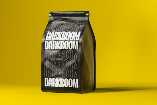 Black package mockup with bold typography on yellow background, ideal for showcasing design and branding work.
