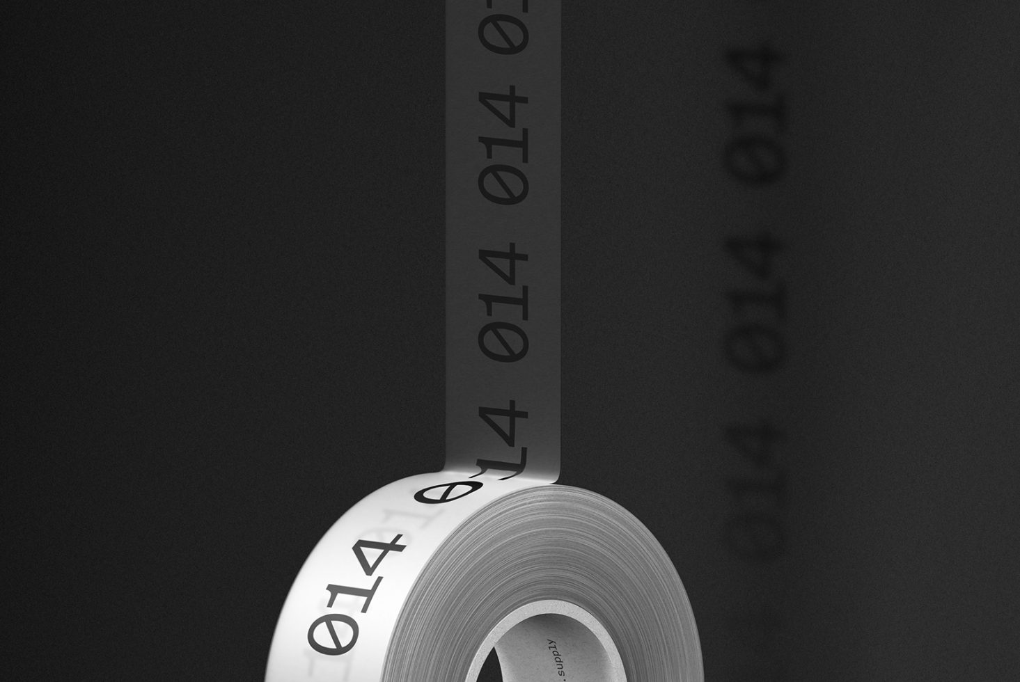 Roll of adhesive tape with numbers unraveling on dark background, minimalist design concept, digital assets for graphics, creative mockup template.