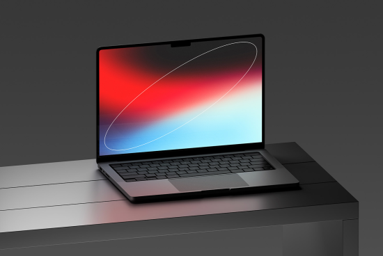 Sleek modern laptop on desk with vibrant screen display, perfect for mockups, technology graphics, and digital design presentations.
