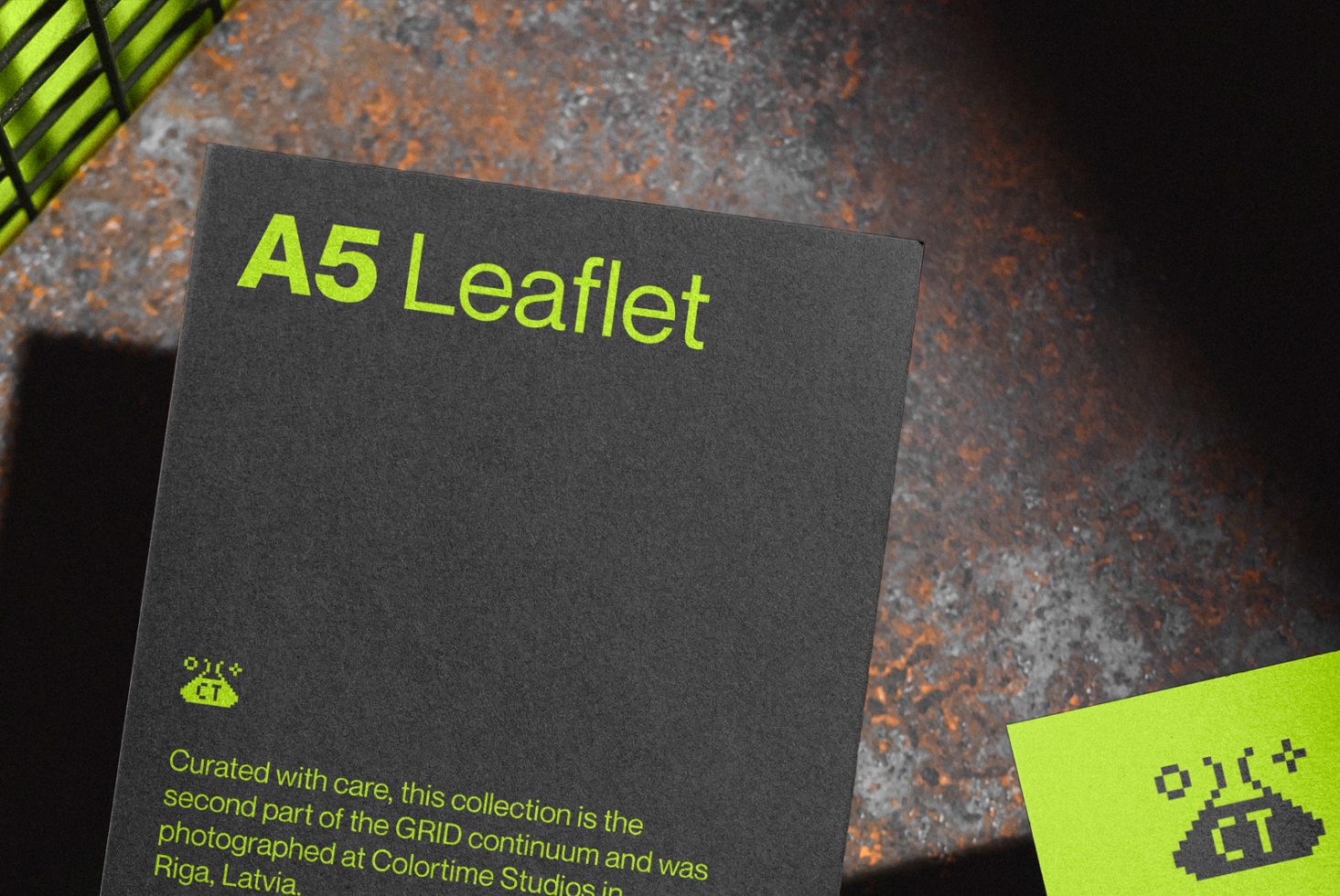 A5 Leaflet mockup with a neon accent on dark textured background, design presentation, editable template, digital asset for graphic designers.