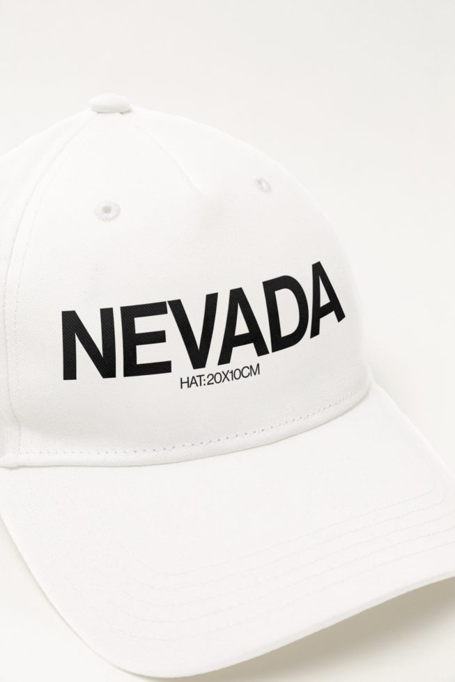 White baseball cap mockup with black text Nevada, isolated on a light background, adjustable size indication for graphic design usage.