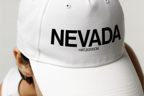 White baseball cap front view with bold NEVADA text, for mockup graphics design template, stylish apparel headwear marketing.