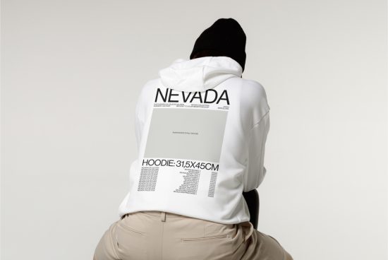 Rear view of person in white hoodie mockup with text design for apparel presentation, suitable for graphics display on digital asset marketplace.
