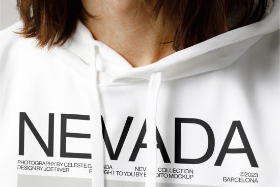 Close-up view of white hoodie mockup with bold NEVADA print, ideal for clothing design presentations and fashion portfolio.