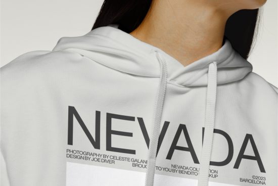 Close-up of a white hoodie mockup with black text design for fashion apparel presentation, showcasing font and typography on clothing.