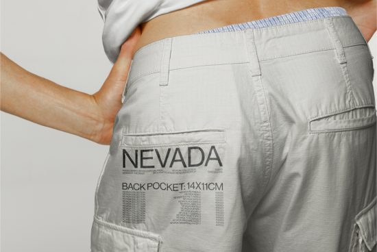 Close-up of gray trousers with Nevada print, demonstrating back pocket size for fashion mockup, design asset display.