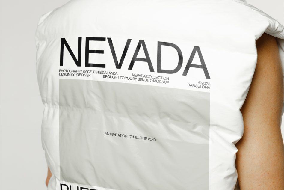 Front facing white puffer vest with bold Nevada text layout on garment
