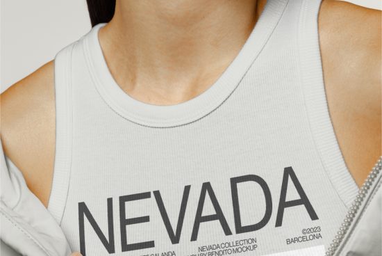 Close-up of a white tank top mockup with bold NEVADA text, ideal for fashion design presentations and apparel branding visuals.