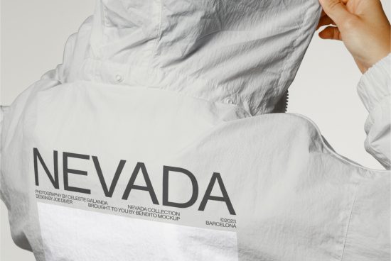 Close-up of a white shirt mockup with NEVADA text, emphasizing design and fabric, ideal for fashion templates and graphics display.