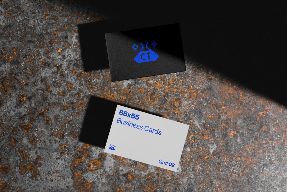 Blue neon logo on black card, white card below with blue text on textured surface