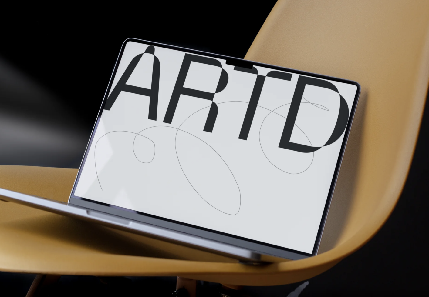 Laptop on yellow chair displaying bold font design, ideal for graphic templates, modern typography mockup, digital design asset.