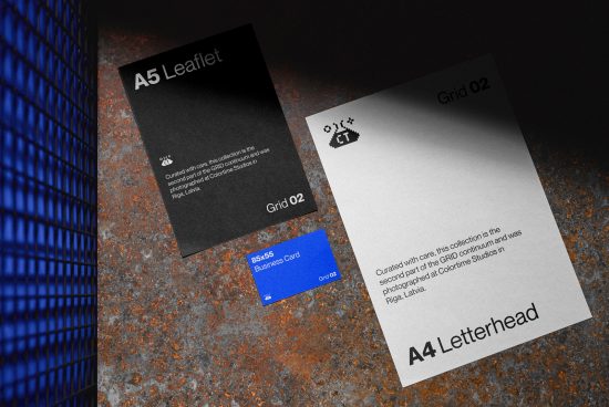 Corporate stationery design mockup displaying A5 leaflet, business card, and A4 letterhead on textured background for showcasing branding work.