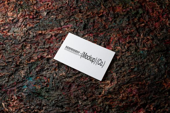 Business card mockup on textured colorful background, ideal for presenting business card designs to clients, realistic digital asset for designers.