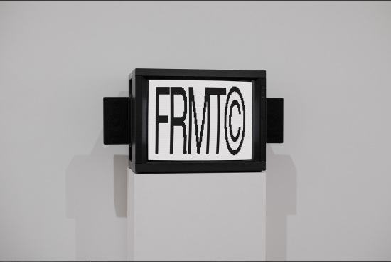 Wall-mounted digital display showcasing bold black and white font design, ideal for graphic typography inspiration.