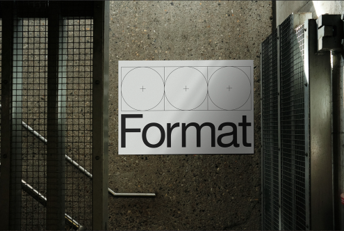 Urban Poster Mockup featuring bold 'Format' typography against a gritty wall, ideal for graphic design presentations.