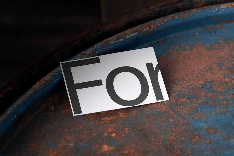 Minimalist business card mockup on rusted metal with patina texture backdrop